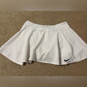 Nike white skirt with underneath shorts.